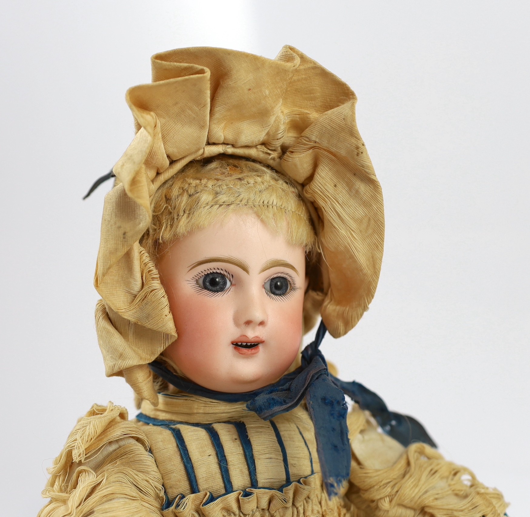 An Henri Alexandre Bébé Phénix pressed bisque doll, French, 1889, 16.5in.